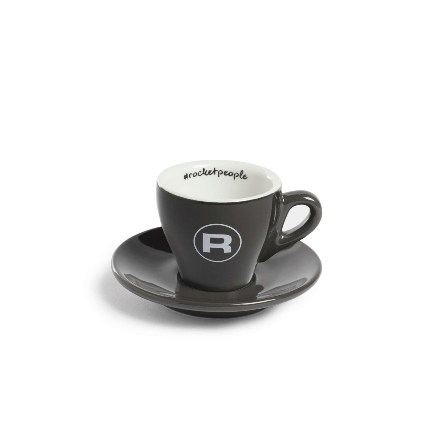 ROCKT ESPRESSOªº«~µP¥d¥¬ªM¡A¥~±¬O¶¦â¡A¸̭±¬O¶¦â¡CªM¤l¥~°¼²°¤º°¼³£¦L¦³ROCKET LOGO¡C³oӪM¤l¦³ªþ½L¤l¡C¥i¦¨É̦ܳh 80mlªº¿@ÁY©@°Ø